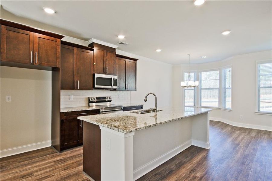 Furnished interior view inside a new home in Towns at Enclave, Lawrenceville (Image 6).