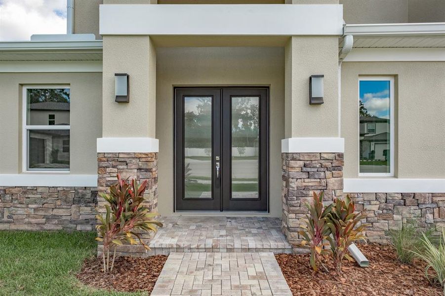 Exterior details and patio area of a home in , Palm Harbor (Image 24).