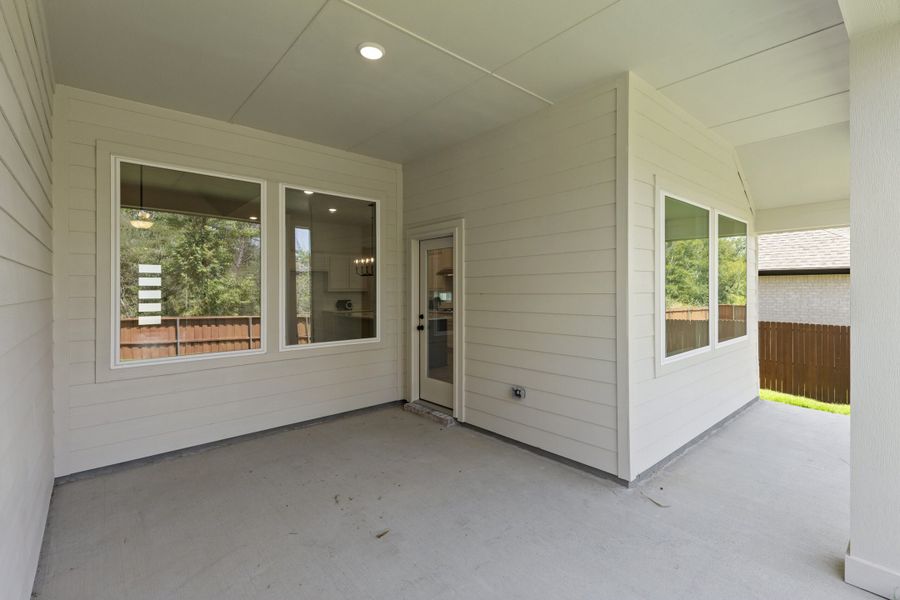 Exterior details and patio area of a home in Heartland, Heartland (Image 3). Exterior details and patio area of a home in Heartland, Heartland (Image 3).