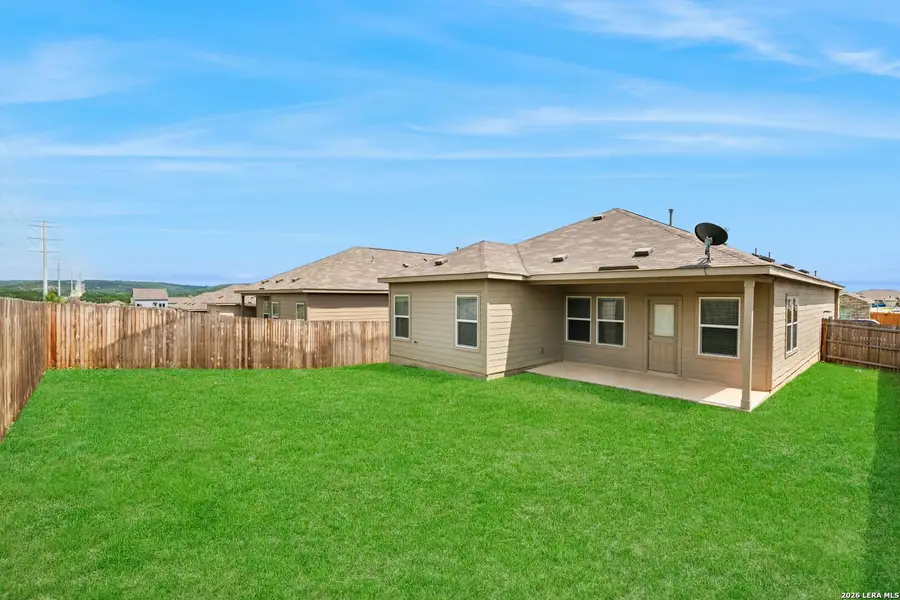 Exterior details and patio area of a home in Hidden Trails, Bulverde (Image 4).