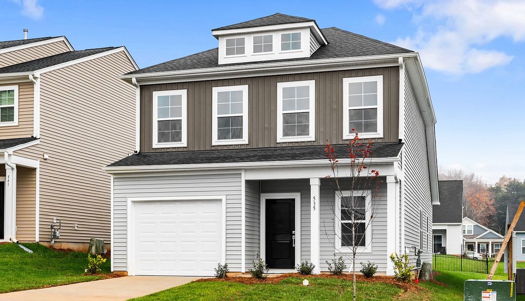 Front exterior of a new home in Hanes Lake, Winston-Salem, NC, highlighting curb appeal (Image 22).