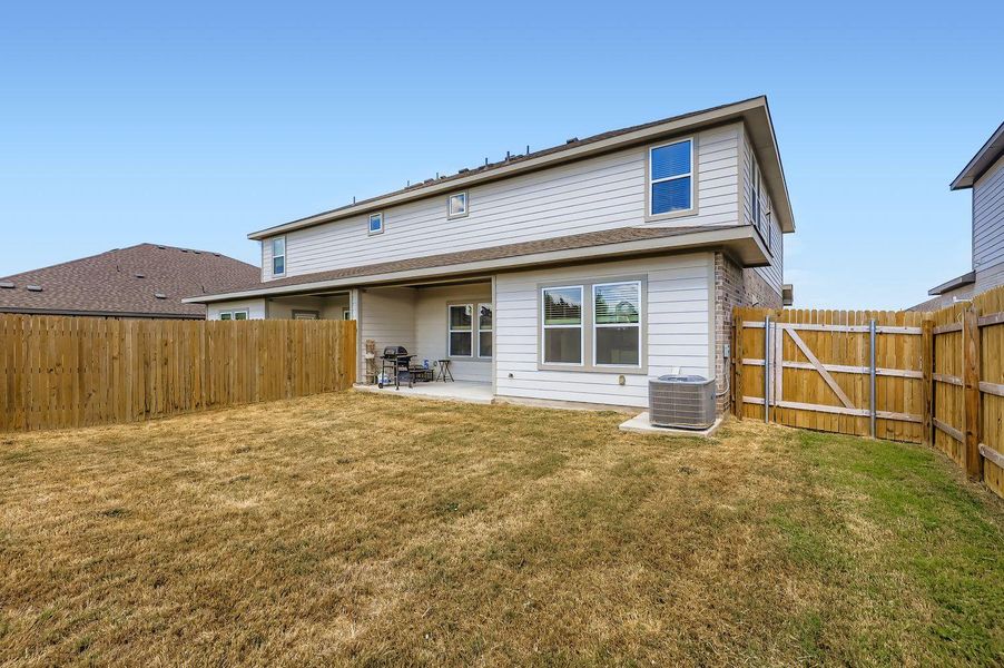 Exterior details and patio area of a home in Palomino, Manor (Image 21). Exterior details and patio area of a home in Palomino, Manor (Image 21).