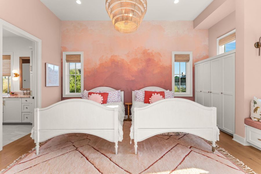 Bedroom featuring light wood-style floors, recessed lighting, a closet, ensuite bathroom, and a chandelier Bedroom featuring light wood-style floors, recessed lighting, a closet, ensuite bathroom, and a chandelier