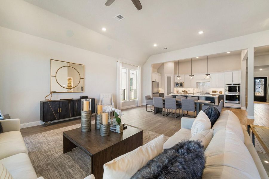 Furnished interior view inside a new home in Ellwood, Iowa Colony (Image 8).