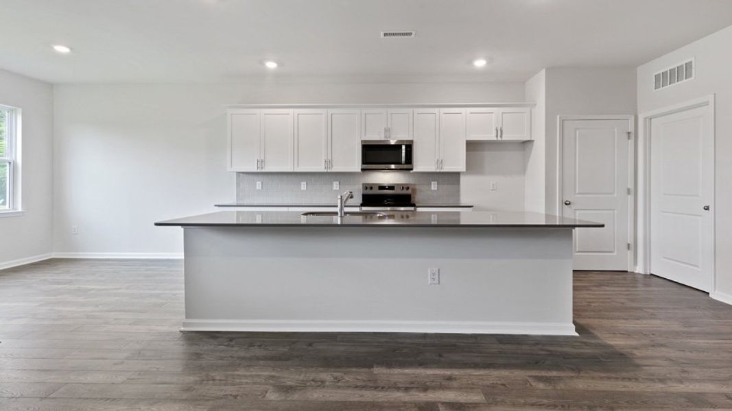 Furnished interior view inside a new home in Baker Farm, Youngsville (Image 7).