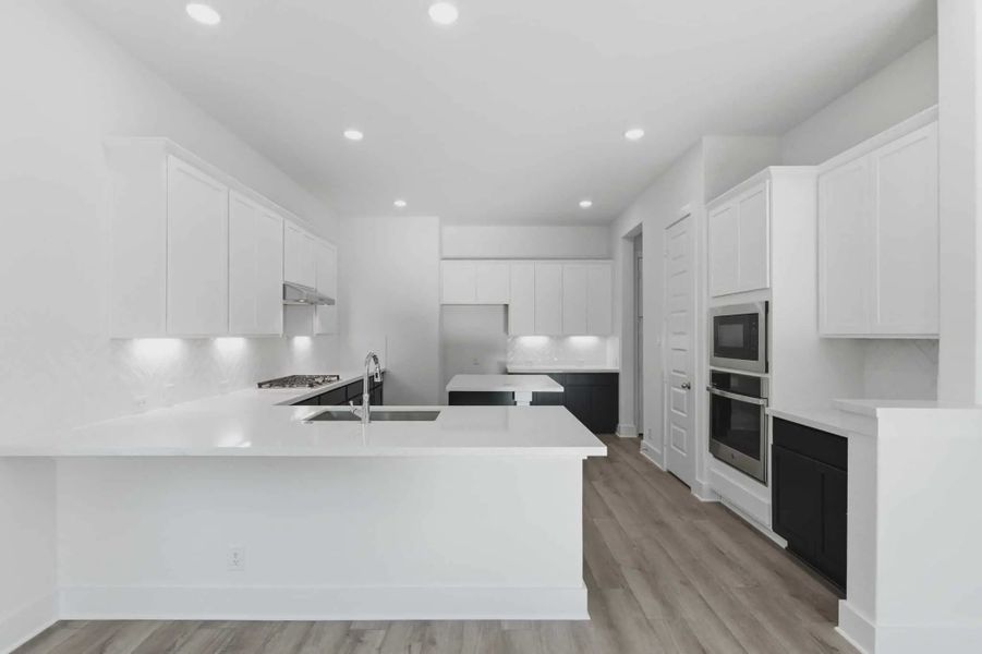 Representative furnished interior of a home built from the Shelby by Chesmar Homes in Buffalo Crossing, Cibolo (Image 11).