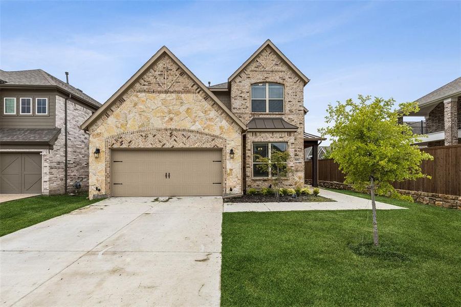 Front exterior of a new home in Lake Shore Village, Rowlett, TX, highlighting curb appeal (Image 23).