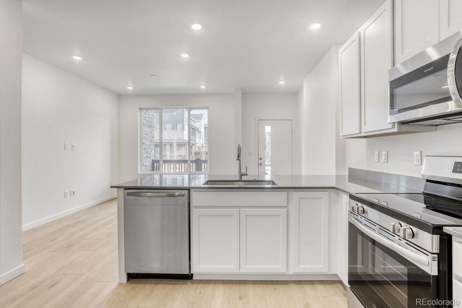 Furnished interior view inside a new home in Parterre, Thornton (Image 3).