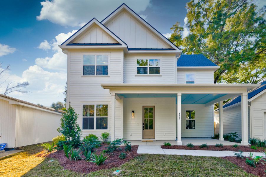 Front exterior of a new home in , Charleston, SC, highlighting curb appeal (Image 2).