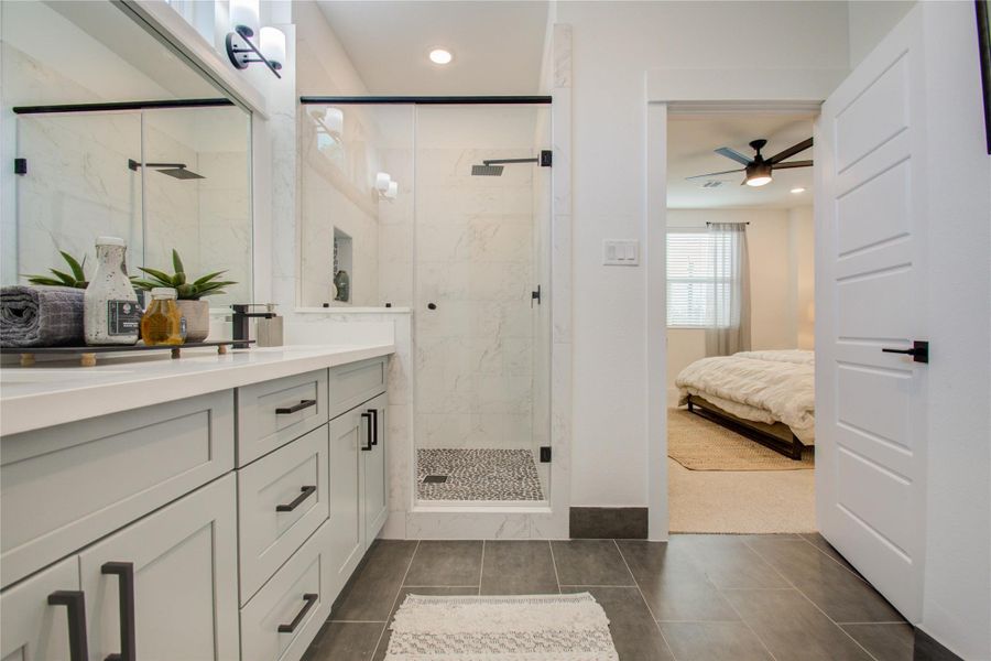 Primary bathroom! Photos from another community by the same builder, FINISHES & FLOOR PLAN WILL VARY! Ceiling fans are not included!