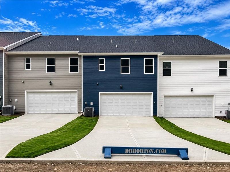 Front exterior of a new home in Brookland Commons, Monroe, GA, highlighting curb appeal (Image 17).