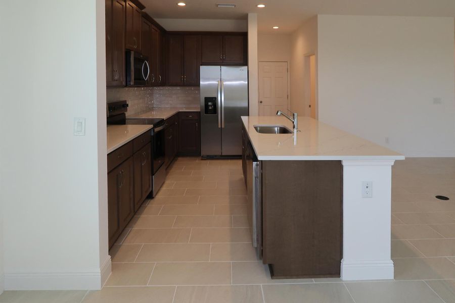 Furnished interior view inside a new home in Ridgeview, Clermont (Image 13).