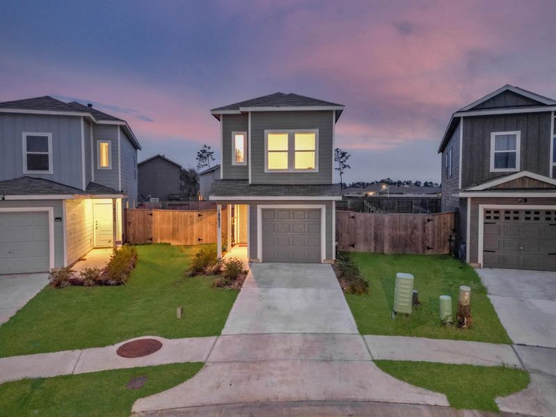Front exterior of a new home in , New Caney, TX, highlighting curb appeal (Image 22). Front exterior of a new home in , New Caney, TX, highlighting curb appeal (Image 22).