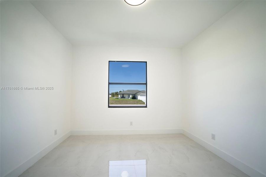 Spacious, unfurnished interior of a new home in , Lehigh Acres (Image 8).