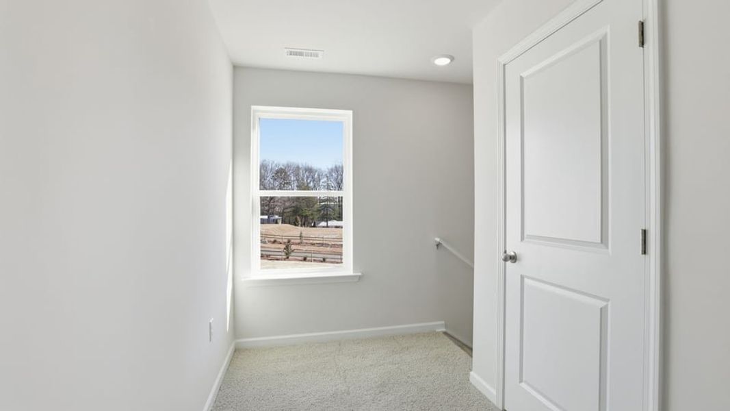 Spacious, unfurnished interior of a new home in Village Grove, Greenville (Image 26).