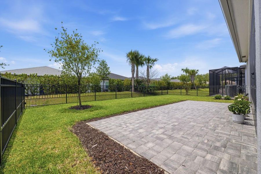 Exterior details and patio area of a home in , Wesley Chapel (Image 21).