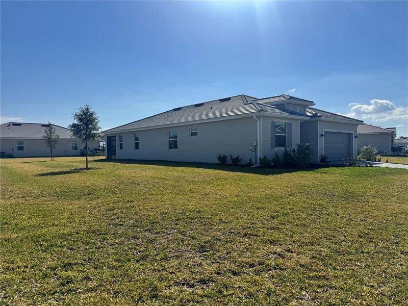 Exterior details and patio area of a home in Harbor East: Executive Homes, Port Charlotte (Image 3). Exterior details and patio area of a home in Harbor East: Executive Homes, Port Charlotte (Image 3).