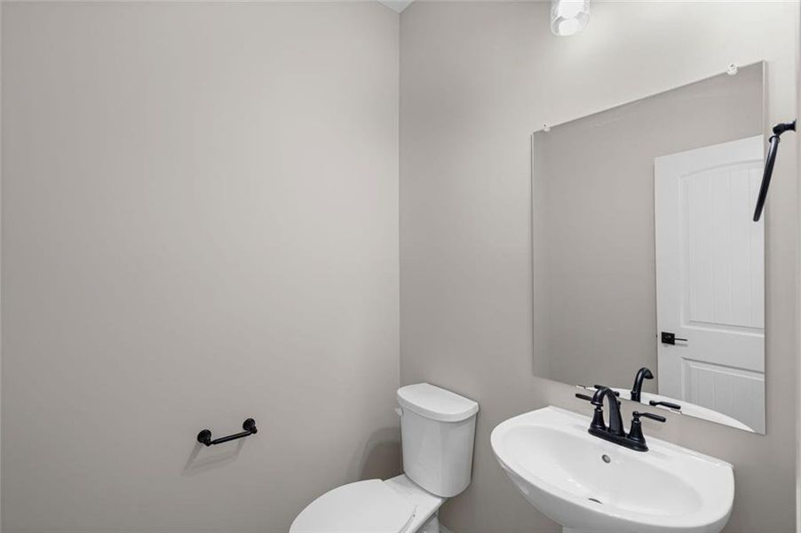 Furnished interior view inside a new home in Hidden Fields, Hoschton (Image 10).