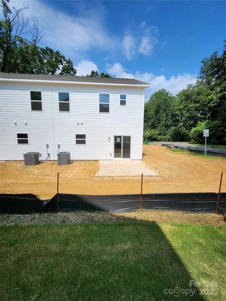 Front exterior of a new home in , Charlotte, NC, highlighting curb appeal (Image 1).
