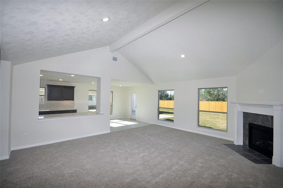 Family room into the Kitchen and Breakfast Rooms.