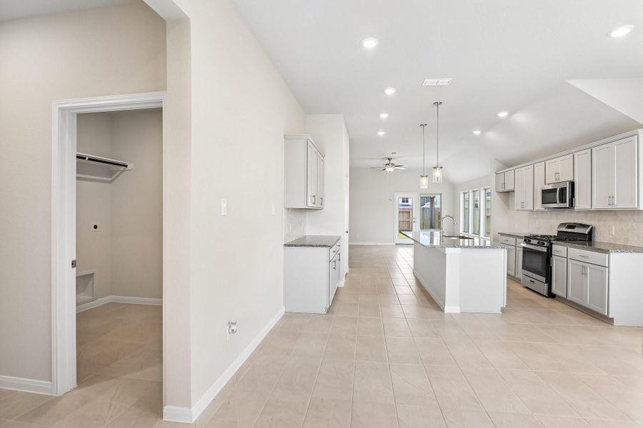 Furnished interior view inside a new home in Aldeana, Bonney (Image 9).