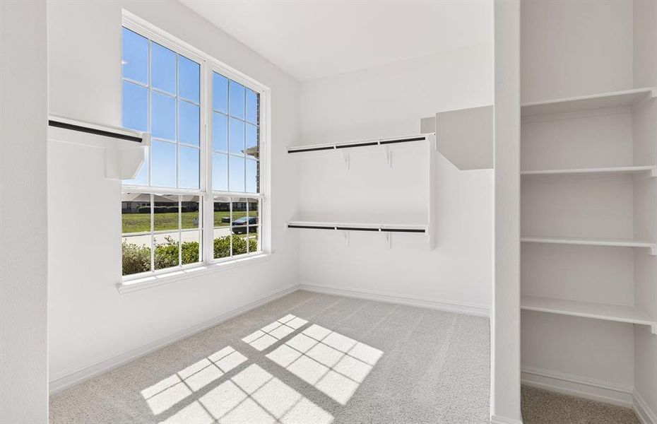 Owner's walk-in closet