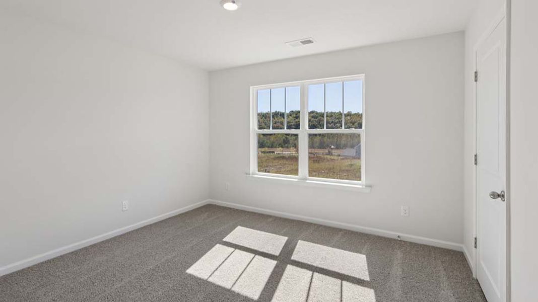 Spacious, unfurnished interior of a new home in Rydele Heights, Asheville (Image 41).