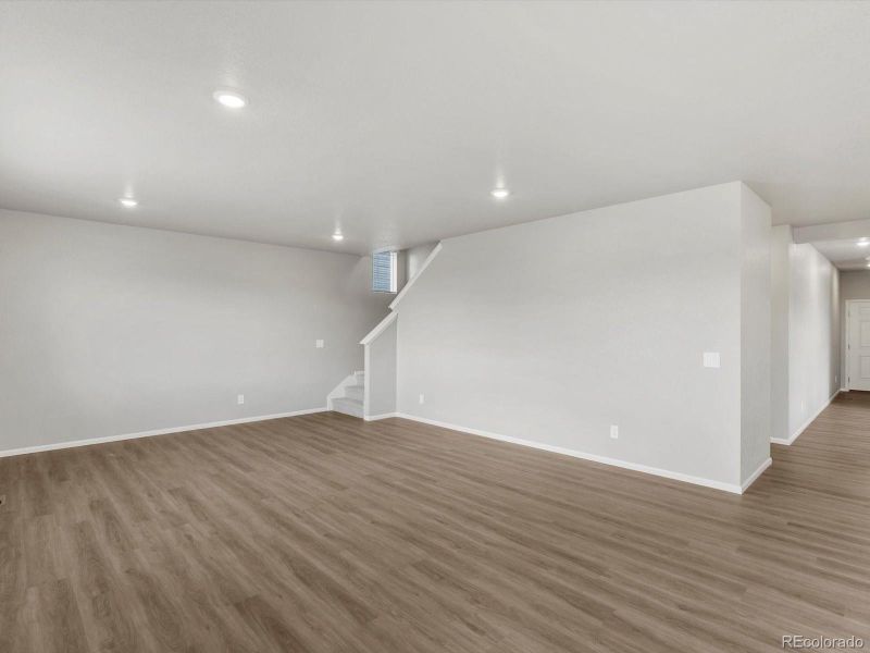 Spacious, unfurnished interior of a new home in Ridgeline Vista: The Flora Collection, Brighton (Image 23). Spacious, unfurnished interior of a new home in Ridgeline Vista: The Flora Collection, Brighton (Image 23).