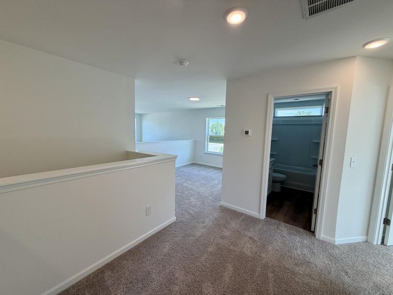 Spacious, unfurnished interior of a new home in Bellevue Townhomes, Greenville (Image 12).