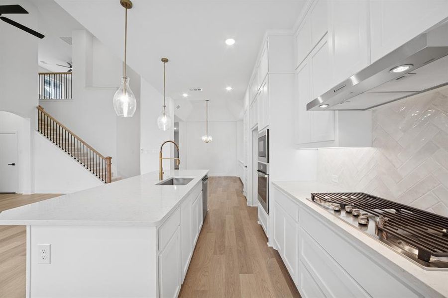 Furnished interior view inside a new home in Pecan Square - Gardens, Northlake (Image 6). Furnished interior view inside a new home in Pecan Square - Gardens, Northlake (Image 6).