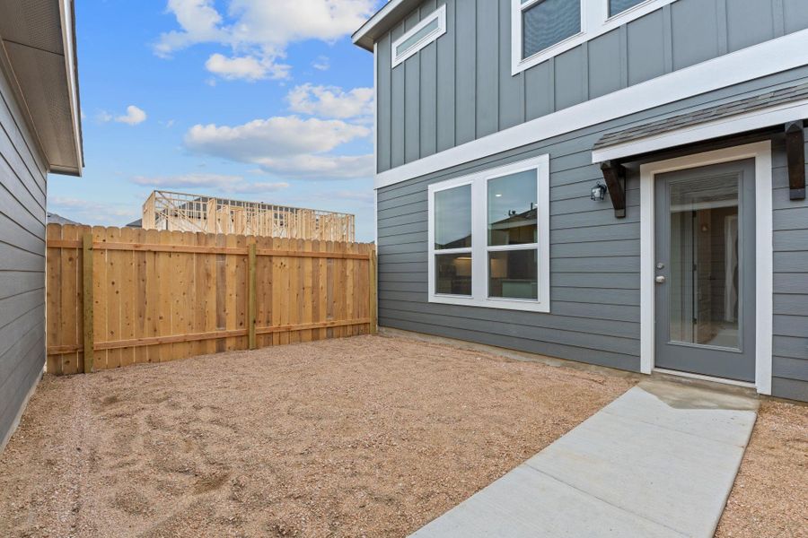 Exterior details and patio area of a home in Retreat at Hero Way, Leander (Image 3).