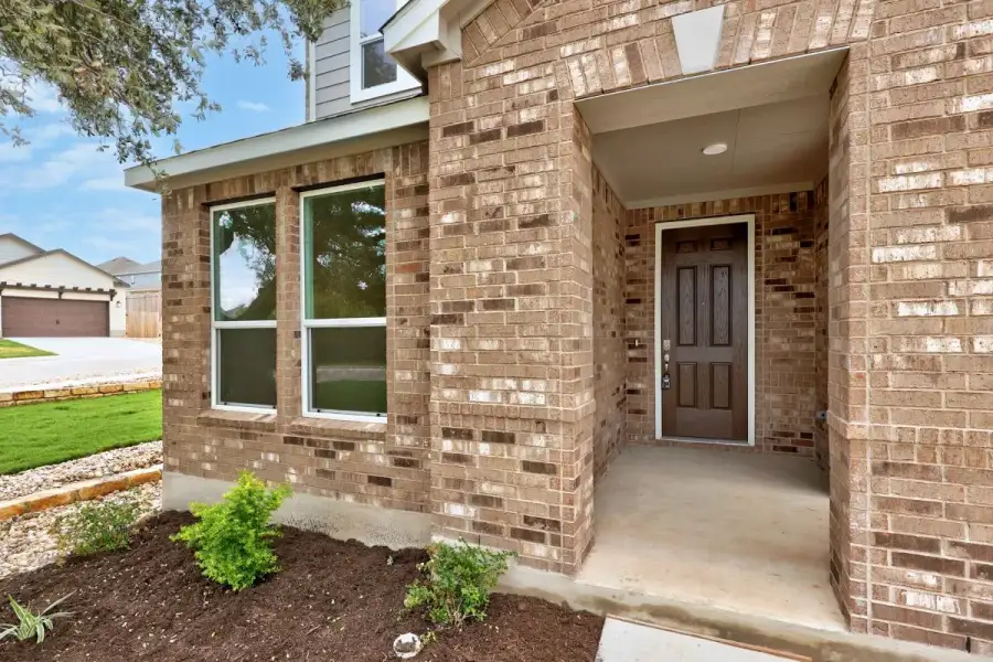 Exterior details and patio area of a home in River Bluff, Leander (Image 3).