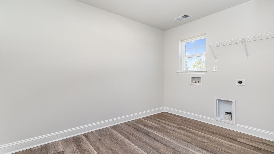 Spacious, unfurnished interior of a new home in Auberon Woods, Conway (Image 22).