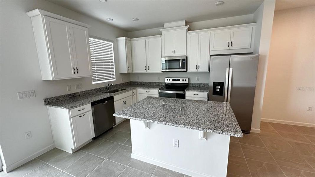 Furnished interior view inside a new home in , Kissimmee (Image 4). Furnished interior view inside a new home in , Kissimmee (Image 4).