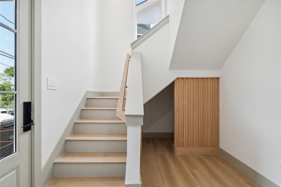 Subtle architectural cues delineate spaces while maintaining an open-concept feel.