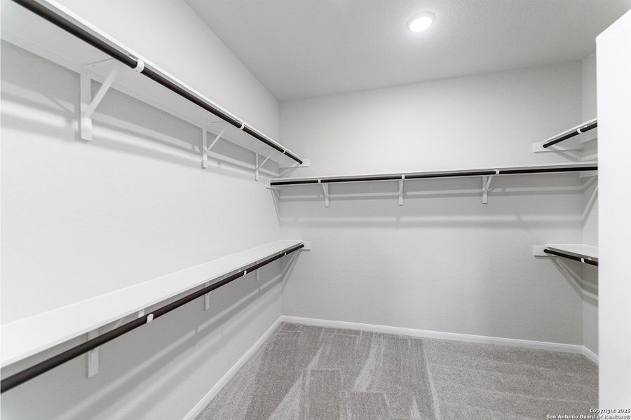 Spacious, unfurnished interior of a new home in The Woodlands at Medina Hills, Mico (Image 14).