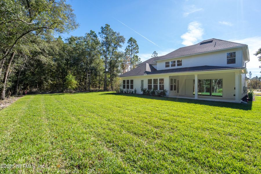 Exterior details and patio area of a home in SilverLeaf, St. Augustine (Image 3).