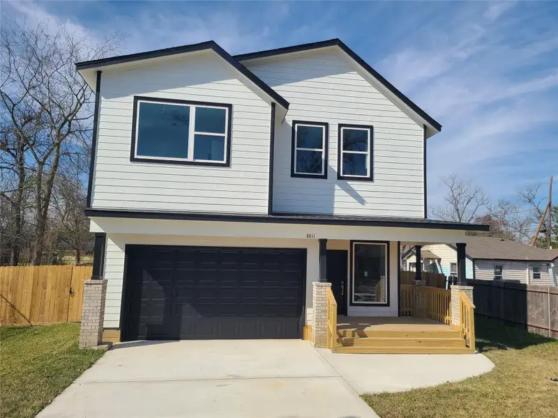Front exterior of a new home in , Houston, TX, highlighting curb appeal (Image 1). Front exterior of a new home in , Houston, TX, highlighting curb appeal (Image 1).