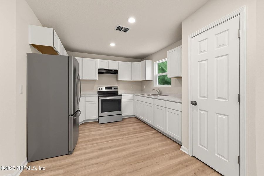 Furnished interior view inside a new home in , Jacksonville (Image 7). Furnished interior view inside a new home in , Jacksonville (Image 7).