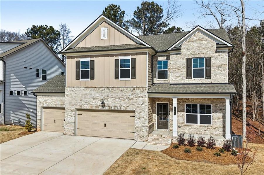 Front exterior of a new home in Rosewood Lake Estates, Hoschton, GA, highlighting curb appeal (Image 31).