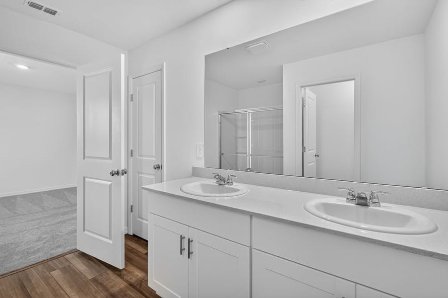 Representative furnished interior of a home built from the Kingfisher by Taylor Morrison in Palm Wind, Hudson (Image 9).