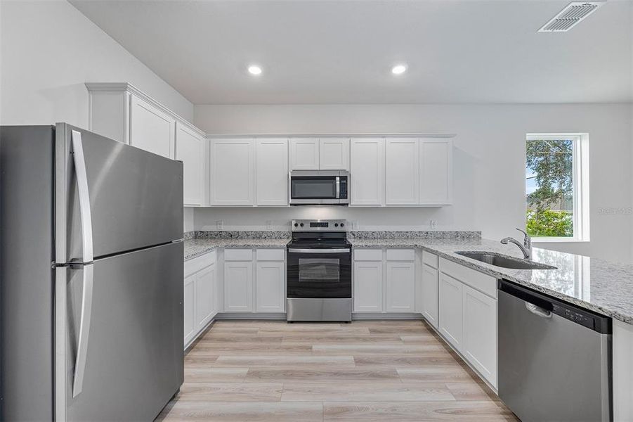 Furnished interior view inside a new home in Poinciana, Poinciana (Image 7). Furnished interior view inside a new home in Poinciana, Poinciana (Image 7).