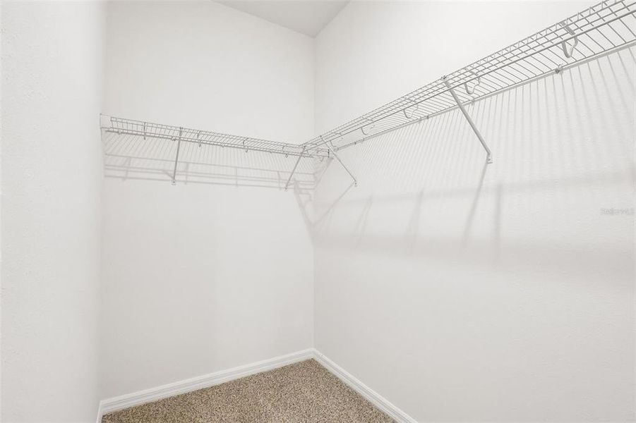 Spacious, unfurnished interior of a new home in The Grove at Stuart Crossing - Signature Series, Bartow (Image 29).