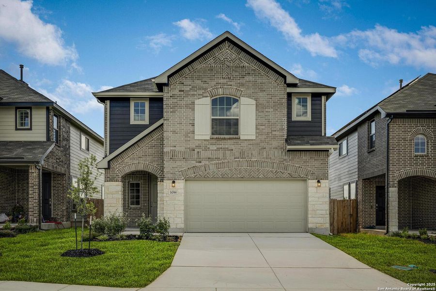 Front exterior of a new home in Morgan Meadows, San Antonio, TX, highlighting curb appeal (Image 17). Front exterior of a new home in Morgan Meadows, San Antonio, TX, highlighting curb appeal (Image 17).