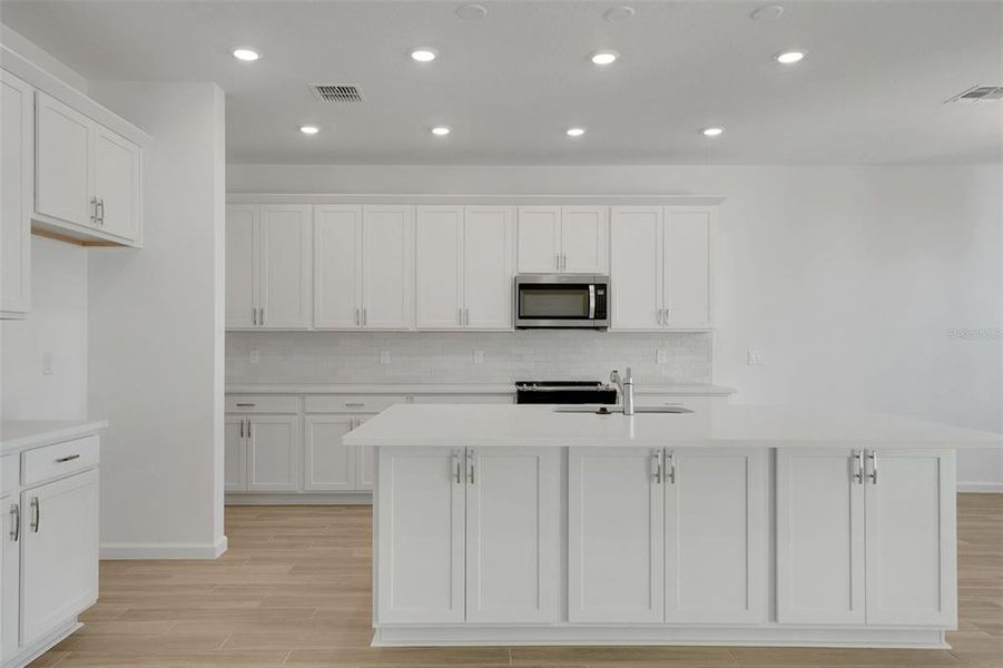 Furnished interior view inside a new home in Green Key Village, Lady Lake (Image 9).