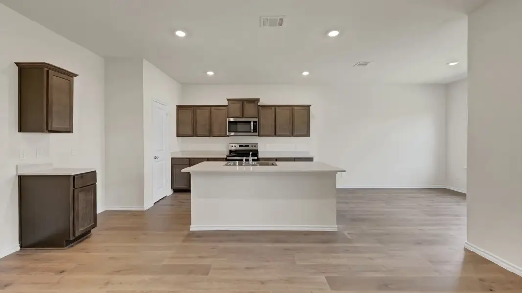 Furnished interior view inside a new home in Blaire Lake, Tyler (Image 3). Furnished interior view inside a new home in Blaire Lake, Tyler (Image 3).