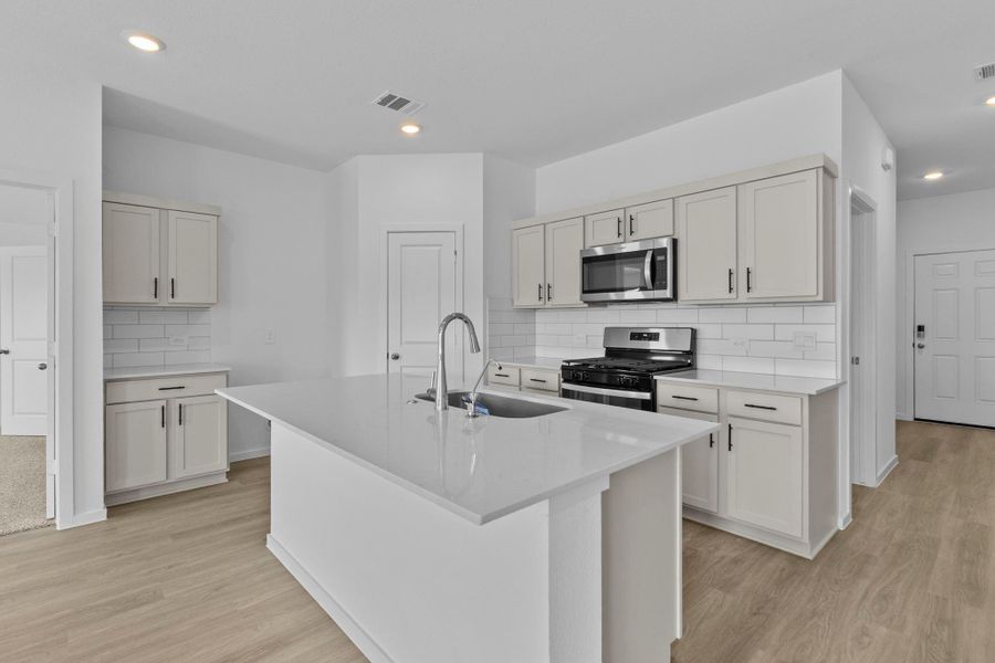 Furnished interior view inside a new home in Harrington Trails at The Canopies, Splendora (Image 6).