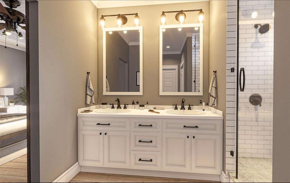 ensuite bathroom with double sinks for convenience, a spacious walk-in shower with tiled finishes, and a generously sized closet designed for two people.