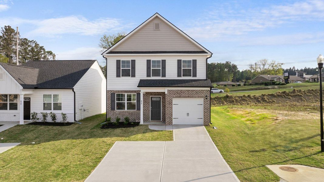 Front exterior of a new home in The Islands, Beech Island, SC, highlighting curb appeal (Image 2).