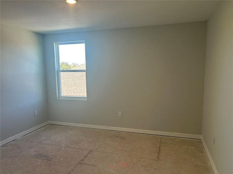 In-progress construction of a new home in Oakfield Trails Traditional, Parrish, FL (Image 35).